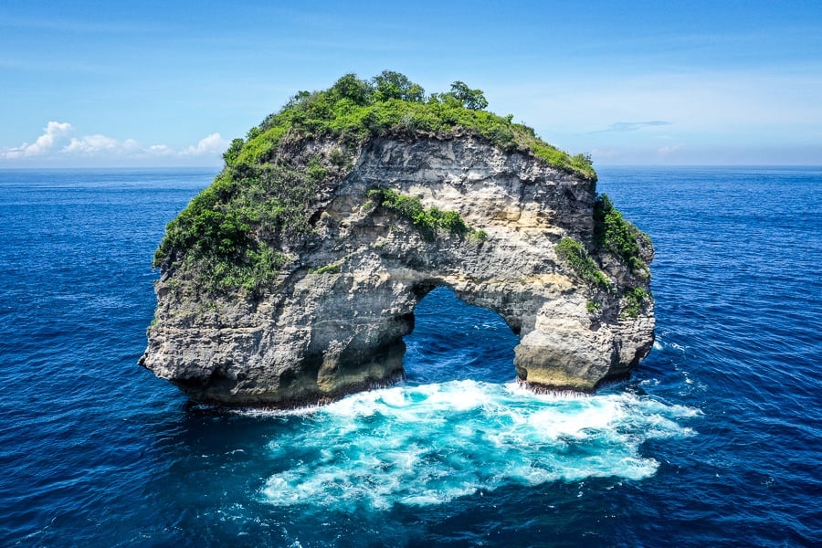 Donut shaped Banah rock near the Banah Cliff Point in Nusa Penida, Bali